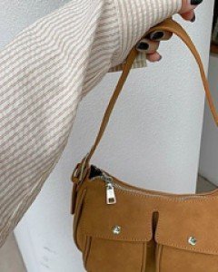 Masking pocket suede bag